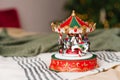 Red and white carousel toy on the background of Christmas Royalty Free Stock Photo