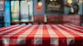 Red and white checkered tablecloth in cozy restaurant interior Royalty Free Stock Photo