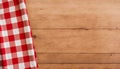 Red and White Checkered Tablecloth on Wooden Background, Copy Space Royalty Free Stock Photo