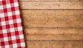 Red and White Checkered Tablecloth on Wooden Background, Copy Space Royalty Free Stock Photo