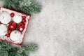 Red and white Christmas baubles in a box Royalty Free Stock Photo