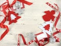 Red and white Christmas decorations on white vintage wood Royalty Free Stock Photo