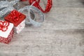 Red and white Christmas packages with glittery ribbon Royalty Free Stock Photo