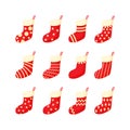 Red and white Christmas stocking set vector illustration in a cartoon flat style Royalty Free Stock Photo