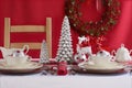 Red and White Christmas Table Setting. Royalty Free Stock Photo