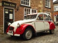 Red and White Citren 2cv French classic vintage car Royalty Free Stock Photo