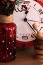 Red and white clock with New Year decoration details