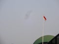 the red and white colored cloth as the Indonesian state flag