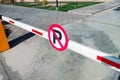 Red and white crossed No Parking sign on the street. Car parking prohibition signage outdoor. Royalty Free Stock Photo
