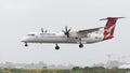 Red-white DHC-8-402 Qantas Airways