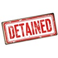 Red and white distressed detained stamp isolated on white background Royalty Free Stock Photo