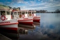 red white excursion boats are moored on the Binnenalster in Hamburg