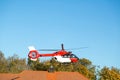 Fire fighter helicopter flying in the air over the city Royalty Free Stock Photo