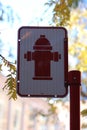 Red and white fire hydrant symbol sign Royalty Free Stock Photo