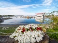 Red and white flowers decorate the seaside walk in Sidney, Vancouver Island, British Columbia to celebrate Canada 150 anniversary Royalty Free Stock Photo