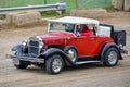 Red and White Ford Convertible Antique Car