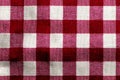 Red and white gingham fabric creating a classic checkered pattern background Royalty Free Stock Photo