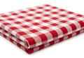 Red and white gingham fabric folded on white background Royalty Free Stock Photo