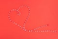 Red and white heart shape thread for a Valentine background Royalty Free Stock Photo