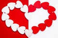 Happy Valentine Day.Concept of polygamy love and February holiday.Red and white hearts on a mixed background red and Royalty Free Stock Photo