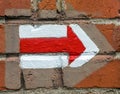 red and white hiking trail signs symbols on brick wall Royalty Free Stock Photo