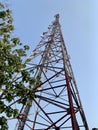 red and white internet network tower