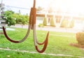 Red and white iron hooks, blurred background in industrial applications.