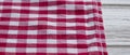 Red and white kitchen cotton fabric in a cage. cotton texture checkered