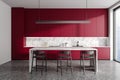 Red and white kitchen interior with bar Royalty Free Stock Photo