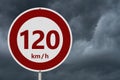 Red and white 120 km speed limit sign