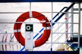 Lifebuoy hanging on railing of ferry Royalty Free Stock Photo