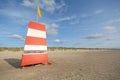 Red-white lifeguard tower on the beach of Henne Strand, Jutland Denmark Royalty Free Stock Photo