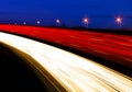 Light trails caused by multiple car headlights and tail lights Royalty Free Stock Photo