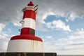 Red and white lighthouse in Povoacao, Sao Miguel, Azores. Portug
