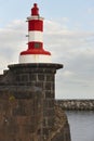 Red and white lighthouse in Povoacao, Sao Miguel, Azores. Portug