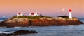 Red with white Lighthouse on sea shore at night in summer. Landscape view Royalty Free Stock Photo