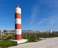 Red white lighttower near Sao Martinho do Porto, Centro - Portugal Royalty Free Stock Photo