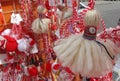 Red and white martenitsi on outdoor market for martenici on the street. Martenitsa or martenitza is given on 1st March as a symbol Royalty Free Stock Photo