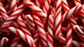 Red and White Mini Candy Canes for Christmas background. Generative AI Royalty Free Stock Photo