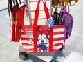 Red and white minnie mouse tote bag with polka dot bow in store display Royalty Free Stock Photo