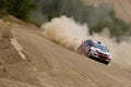 Red and white Mitsubishi Lancer on rally Royalty Free Stock Photo