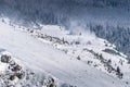 Red and White mountain rescue helicopter providing emergency service