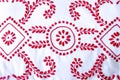 Red and white needlework