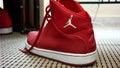 Red and white Nike MJ 23 sneakers