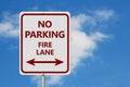 Red and white No Parking fire lane Sign