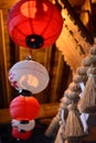 Red and white paper lanterns in Shinto shrine