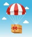 Red and White Parachute Holding Delivery Box Royalty Free Stock Photo