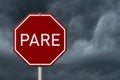 Red and white Pare stop sign