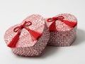 Red and white patterned gift boxes with tassels isolated on white background Royalty Free Stock Photo
