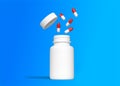 Red-white pills fly out of the bottle on blue background Royalty Free Stock Photo